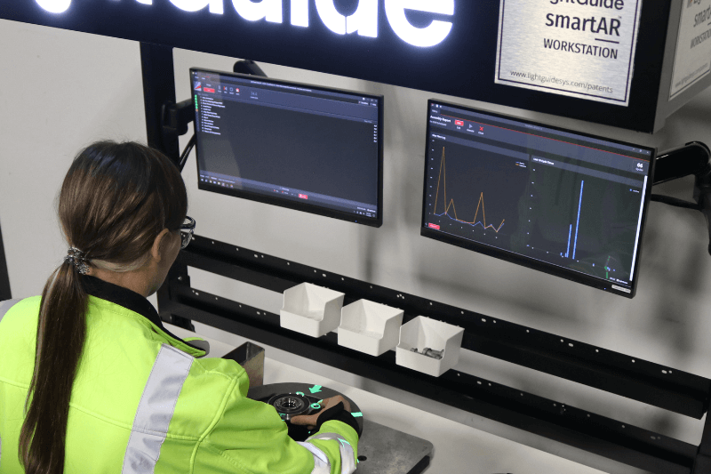 LightGuide smartAR workstation with augmented reality workstation with manual process data for manufacturing analytics