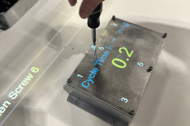 AR work instructions show operator cycle time directly on component being assembled